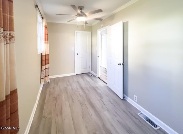 4 Hillside Ave, Schenectady, NY 12308 - unfurnished bedroom with light wood-type flooring, crown molding, and a ceiling fan