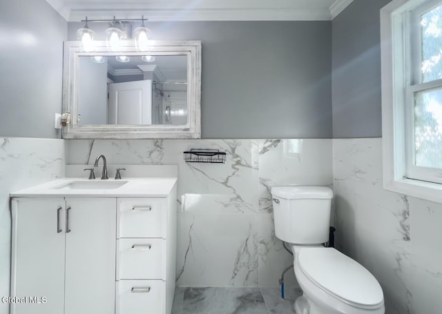 4 Hillside Ave, Schenectady, NY 12308 - bathroom featuring tile walls, ornamental molding, vanity, marble finish flooring, and wainscoting