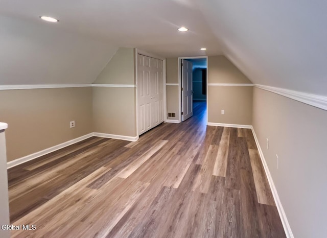 4 Hillside Ave, Schenectady, NY 12308 - bonus room with vaulted ceiling, wood finished floors, and recessed lighting