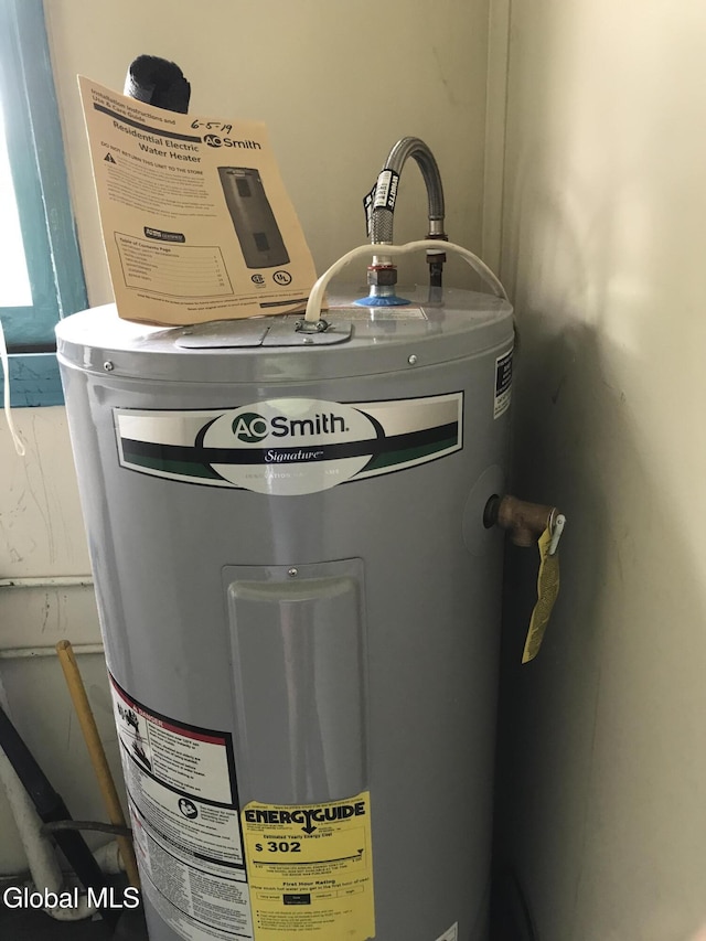 23 Cottage Hill Rd, Queensbury, NY 12804 - utility room with electric water heater