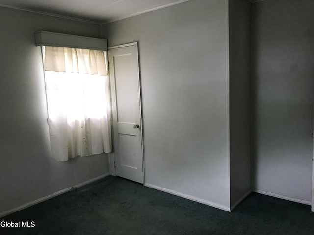 23 Cottage Hill Rd, Queensbury, NY 12804 - carpeted empty room featuring baseboards and ornamental molding