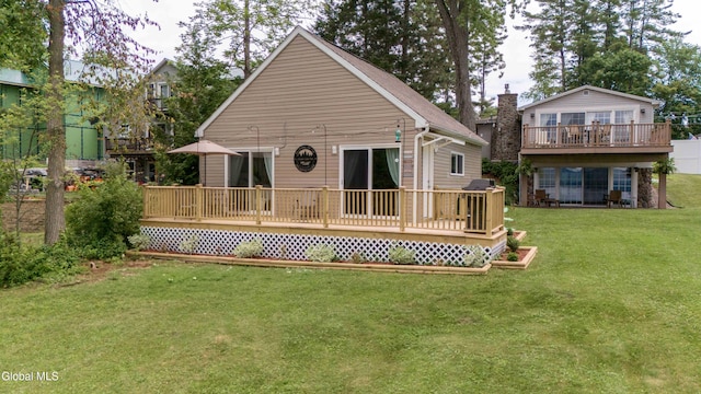 115 Shore Dr, Broadalbin, NY 12025 - rear view of house featuring a wooden deck and a lawn