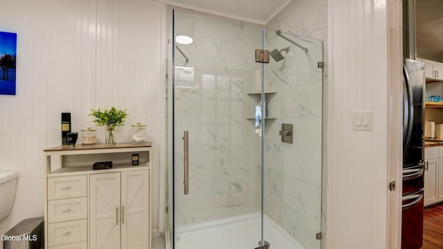 115 Shore Dr, Broadalbin, NY 12025 - full bathroom with a marble finish shower and wood finished floors