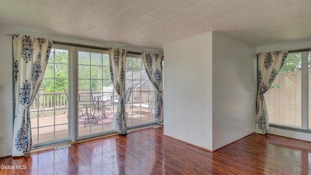 115 Shore Dr, Broadalbin, NY 12025 - empty room featuring wood finished floors and crown molding