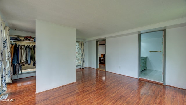 115 Shore Dr, Broadalbin, NY 12025 - unfurnished bedroom with wood finished floors and ensuite bath
