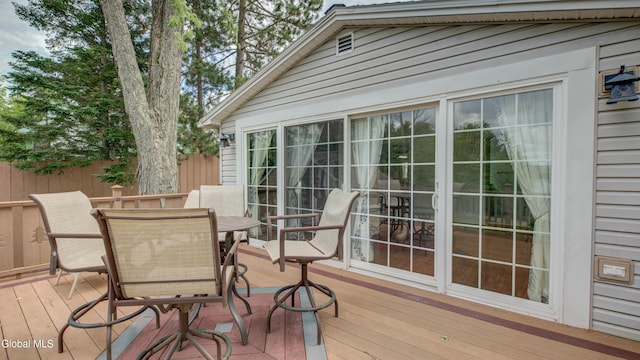 115 Shore Dr, Broadalbin, NY 12025 - wooden deck featuring outdoor dining space