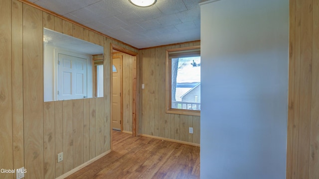 115 Shore Dr, Broadalbin, NY 12025 - unfurnished room featuring wood finished floors and wood walls