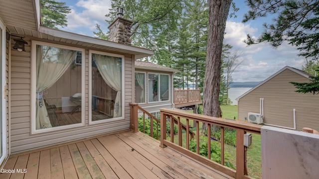115 Shore Dr, Broadalbin, NY 12025 - wooden terrace with a water view