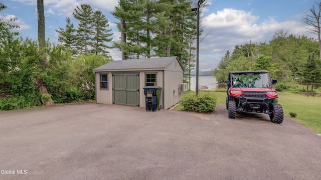 115 Shore Dr, Broadalbin, NY 12025 - garage featuring a shed