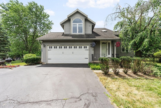 5 Gregg Rd, Altamont, NY 12009 - traditional-style home featuring driveway, an attached garage, and a shingled roof