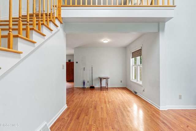 5 Gregg Rd, Altamont, NY 12009 - empty room featuring wood finished floors and stairway