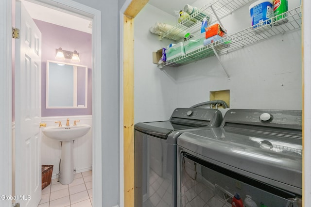 5 Gregg Rd, Altamont, NY 12009 - laundry area featuring washing machine and clothes dryer and light tile patterned floors