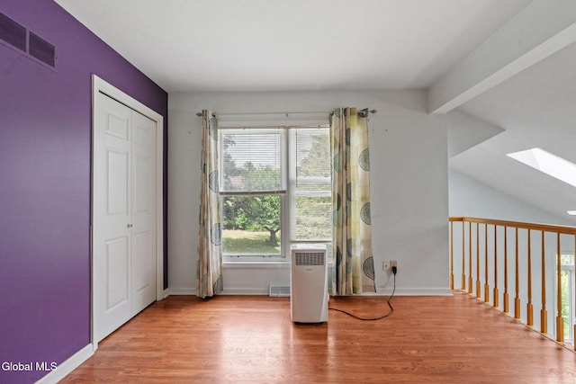 5 Gregg Rd, Altamont, NY 12009 - unfurnished bedroom with a skylight and wood finished floors