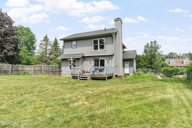 5 Gregg Rd, Altamont, NY 12009 - back of property featuring a fenced backyard, a wooden deck, and a chimney