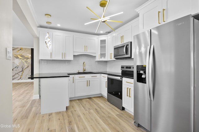 789 Troy Schenectady Rd, Colonie, NY 12110 - kitchen featuring appliances with stainless steel finishes, dark countertops, white cabinetry, and recessed lighting