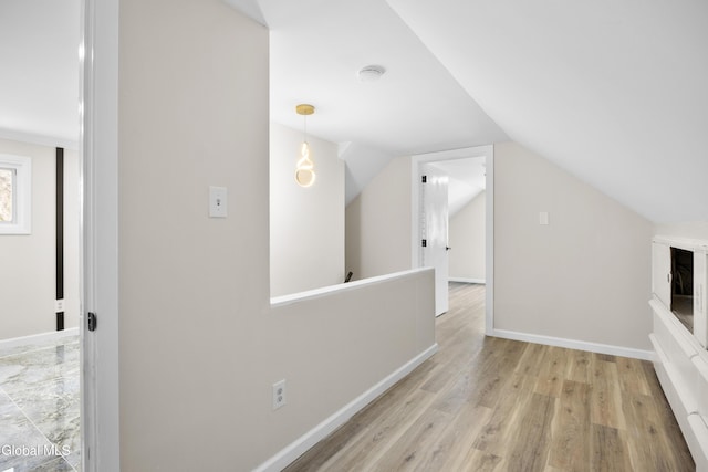 789 Troy Schenectady Rd, Colonie, NY 12110 - bonus room featuring wood finished floors and vaulted ceiling