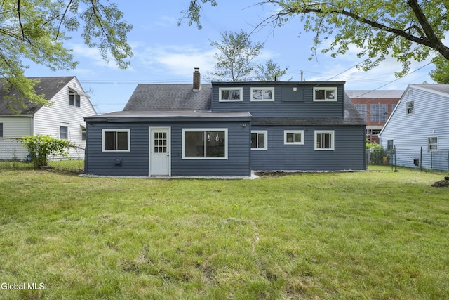 789 Troy Schenectady Rd, Colonie, NY 12110 - back of property featuring a chimney and a shingled roof