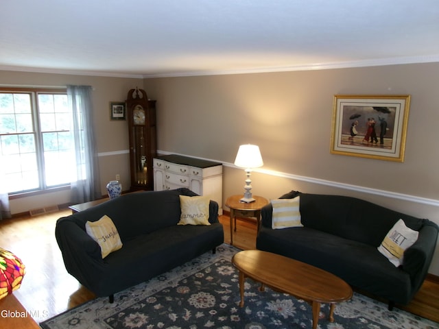 22 Frances Ln, Bethlehem, NY 12203 - living room with wood finished floors and crown molding
