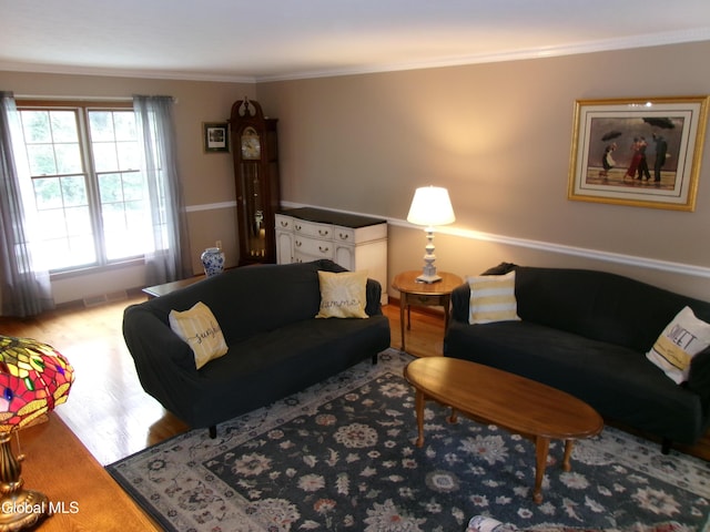 22 Frances Ln, Bethlehem, NY 12203 - living area featuring wood finished floors and crown molding