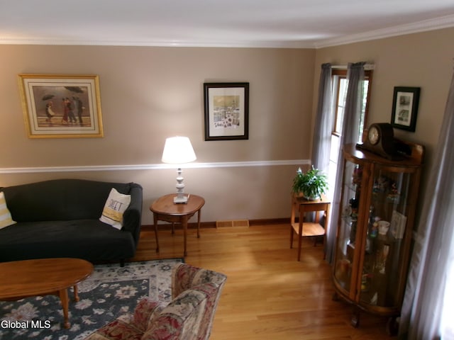 22 Frances Ln, Bethlehem, NY 12203 - living area with wood finished floors and crown molding