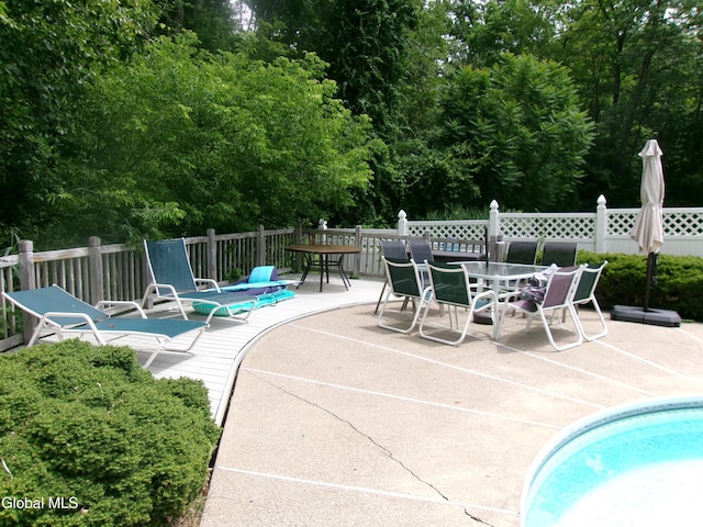 22 Frances Ln, Bethlehem, NY 12203 - view of swimming pool featuring a patio and outdoor dining area