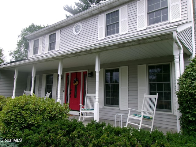 22 Frances Ln, Bethlehem, NY 12203 - view of front facade with covered porch