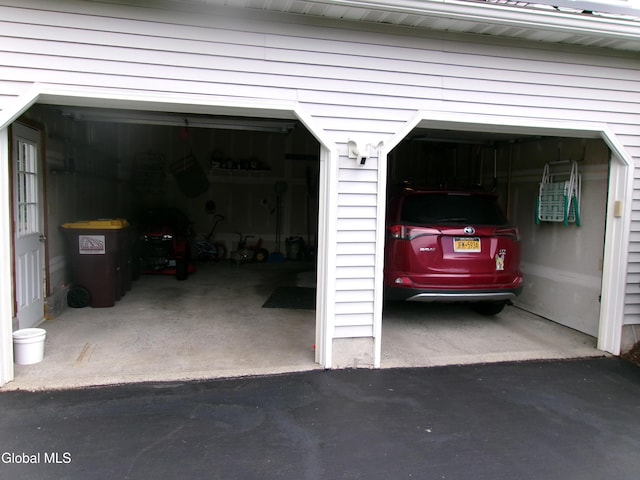 22 Frances Ln, Bethlehem, NY 12203 - garage featuring driveway