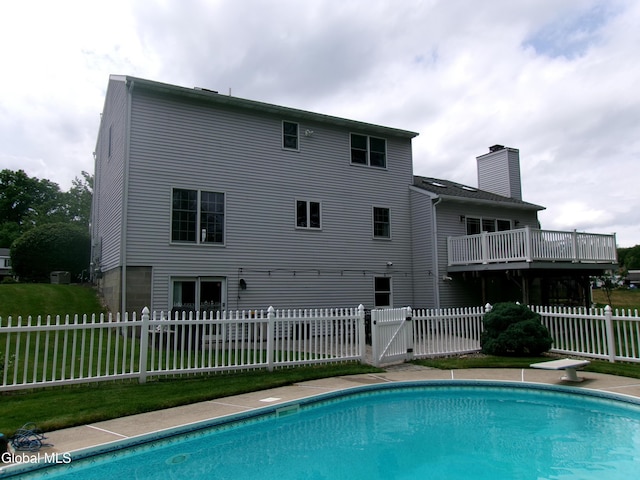 22 Frances Ln, Bethlehem, NY 12203 - view of pool with a gate, a diving board, and a fenced backyard