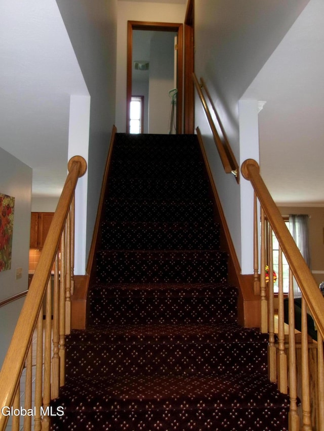 22 Frances Ln, Bethlehem, NY 12203 - stairs with carpet flooring