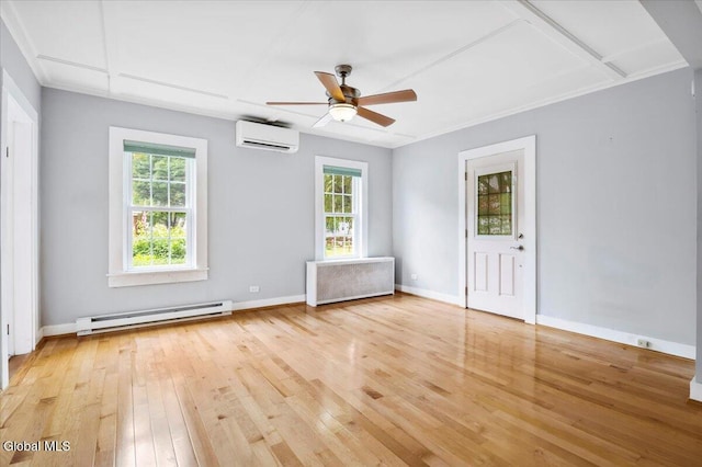 7 Swan St, Hudson Falls, NY 12839 - empty room with baseboard heating, an AC wall unit, plenty of natural light, and light wood-type flooring