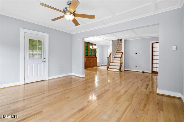7 Swan St, Hudson Falls, NY 12839 - unfurnished living room featuring stairs, a chandelier, light wood-type flooring, and ceiling fan
