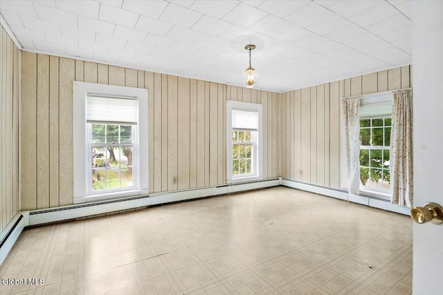 7 Swan St, Hudson Falls, NY 12839 - unfurnished room with tile patterned floors and wood walls
