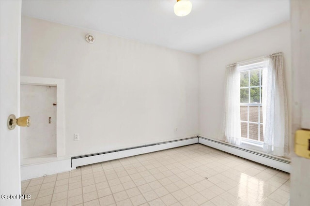 7 Swan St, Hudson Falls, NY 12839 - spare room featuring a baseboard heating unit