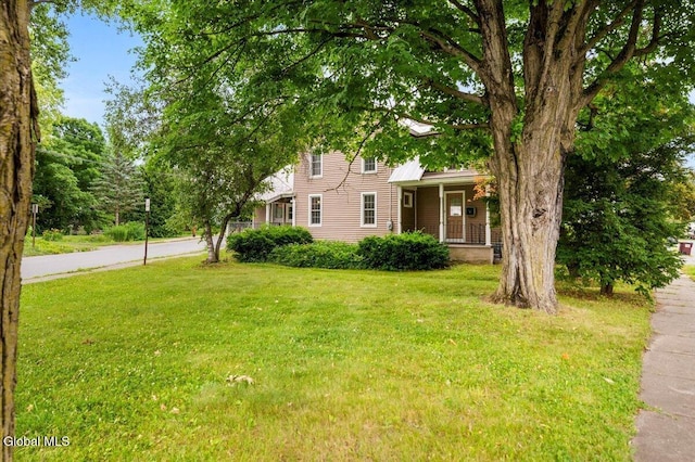 7 Swan St, Hudson Falls, NY 12839 - view of front of property with a front yard and covered porch
