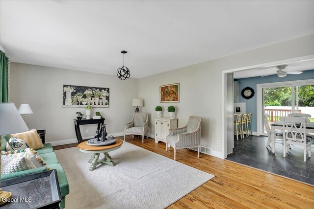 611 Via Ponderosa, Schenectady, NY 12303 - living room featuring baseboards and wood finished floors