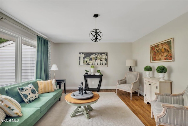 611 Via Ponderosa, Schenectady, NY 12303 - living room featuring light wood-style floors and baseboards