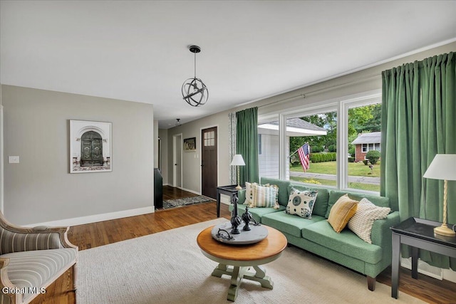 611 Via Ponderosa, Schenectady, NY 12303 - living room featuring wood finished floors and baseboards