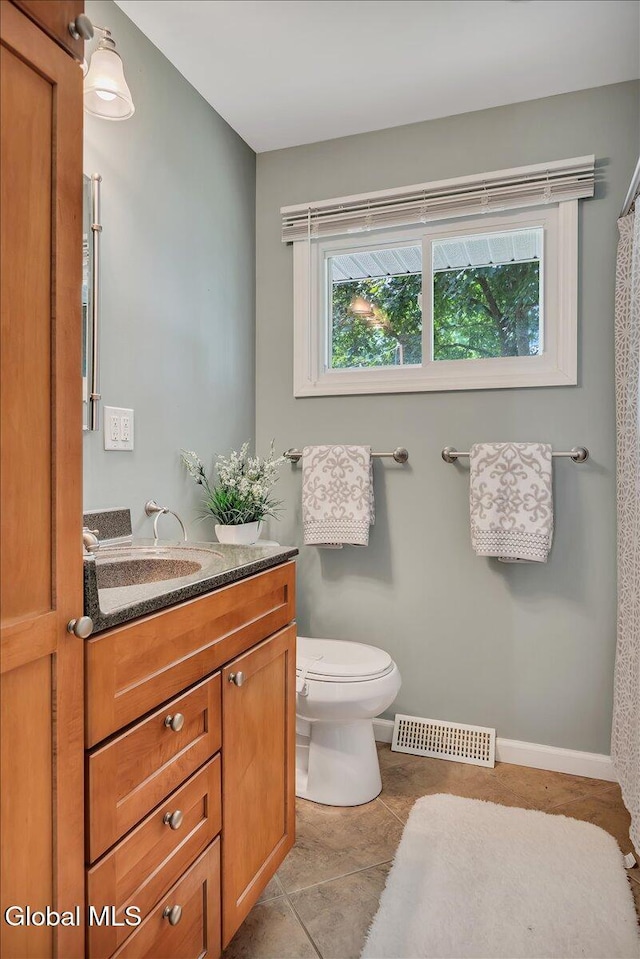 611 Via Ponderosa, Schenectady, NY 12303 - bathroom featuring vanity and tile patterned floors