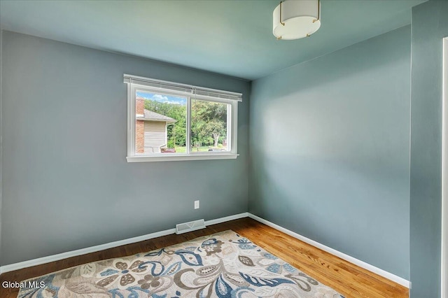 611 Via Ponderosa, Schenectady, NY 12303 - unfurnished room with baseboards and wood finished floors