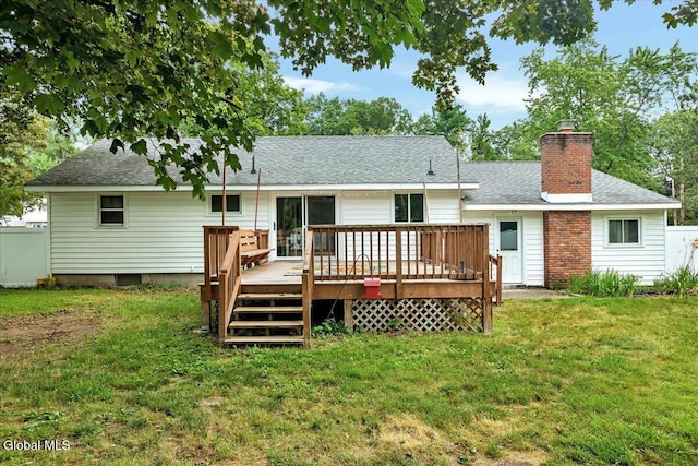 611 Via Ponderosa, Schenectady, NY 12303 - back of property featuring a chimney, a yard, a shingled roof, and a wooden deck