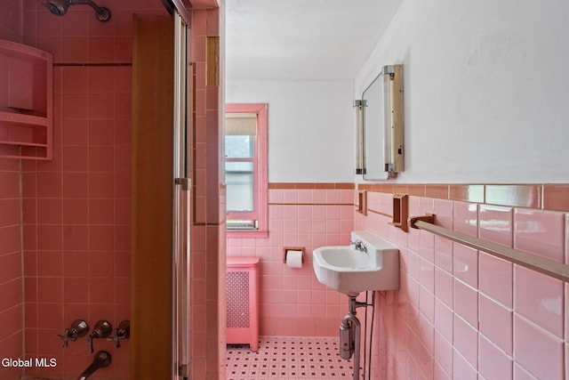2780 Campbell Ave, Schenectady, NY 12306 - bathroom featuring tile walls, wainscoting, enclosed tub / shower combo, and radiator