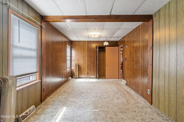 2780 Campbell Ave, Schenectady, NY 12306 - spare room featuring wooden walls and carpet