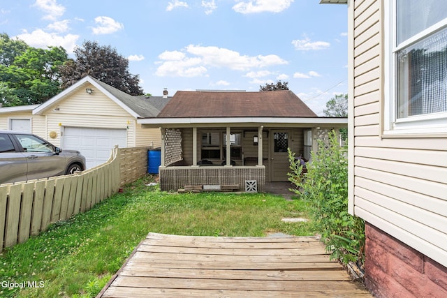 2780 Campbell Ave, Schenectady, NY 12306 - view of front of property featuring a garage, a front yard, a porch, and a shingled roof