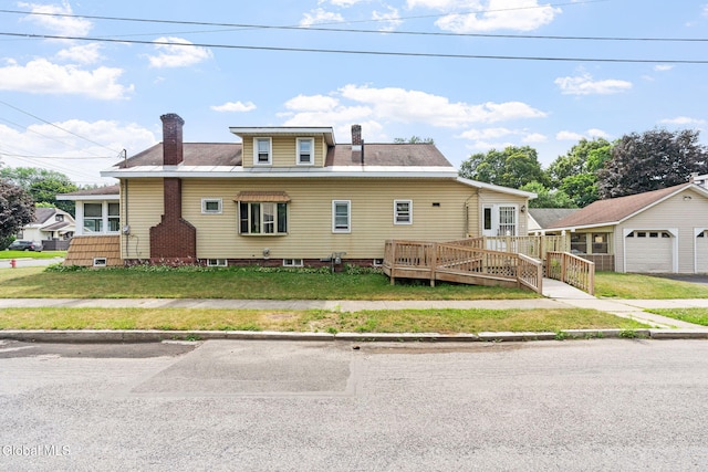 2780 Campbell Ave, Schenectady, NY 12306 - bungalow-style home featuring a chimney, an outbuilding, and a front yard