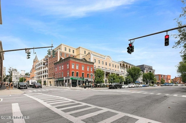 19 Washington St Unit 552P, Saratoga Springs, Inside, NY 12866 - view of asphalt street featuring traffic lights, street lights, sidewalks, and curbs