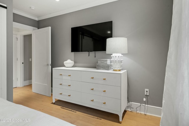 19 Washington St Unit 552P, Saratoga Springs, Inside, NY 12866 - bedroom featuring ornamental molding and light wood-type flooring