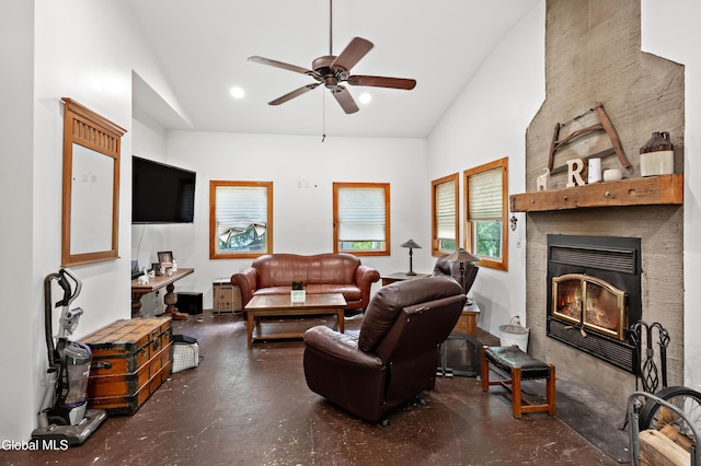 5761 Lake Rd, Galway, NY 12074 - living area featuring lofted ceiling, finished concrete floors, ceiling fan, and a fireplace