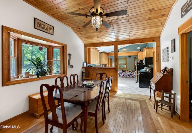 5761 Lake Rd, Galway, NY 12074 - dining space with ceiling fan, lofted ceiling, wood ceiling, and light wood finished floors