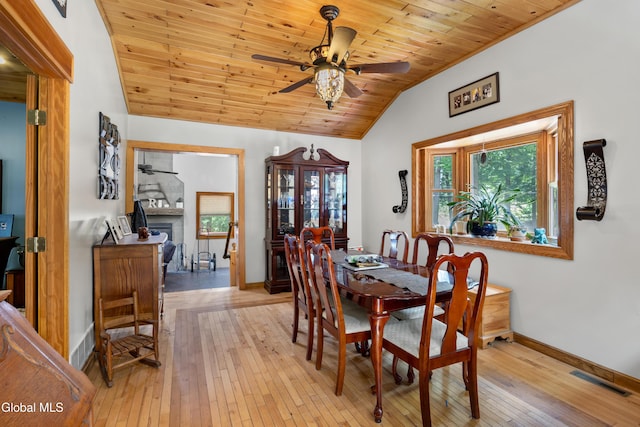 5761 Lake Rd, Galway, NY 12074 - dining area featuring a ceiling fan, vaulted ceiling, wood ceiling, and light wood finished floors