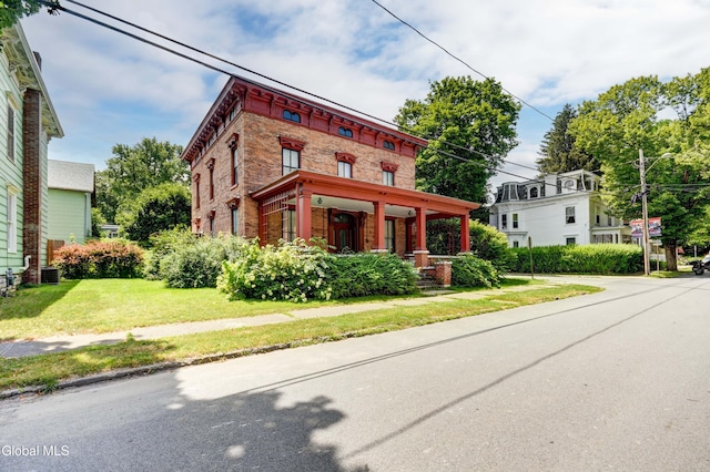 61 Mohawk St, Fort Plain, NY 13339 - italianate-style house featuring a front lawn and brick siding